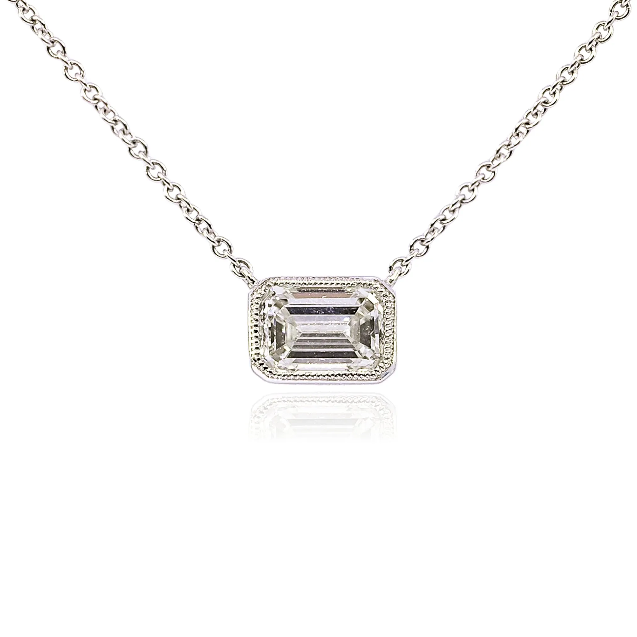 18K WHITE GOLD EMERALD CUT SOLITAIRE DIAMOND NECKLACE - 0.70CTW